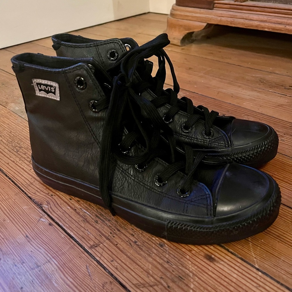 Levi’s black leather high tops